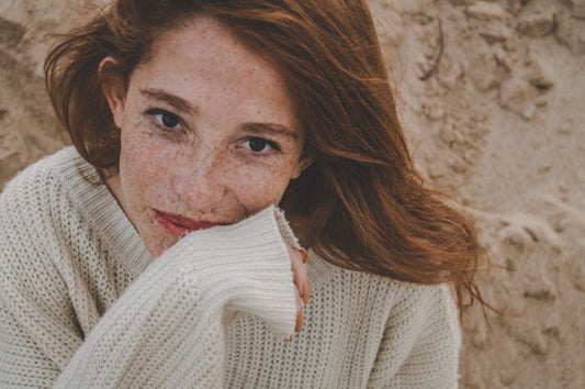 woman-wearing-white-knitted-sweater