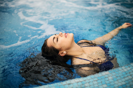 woman-in-blue-bikini-on-swimming-pool