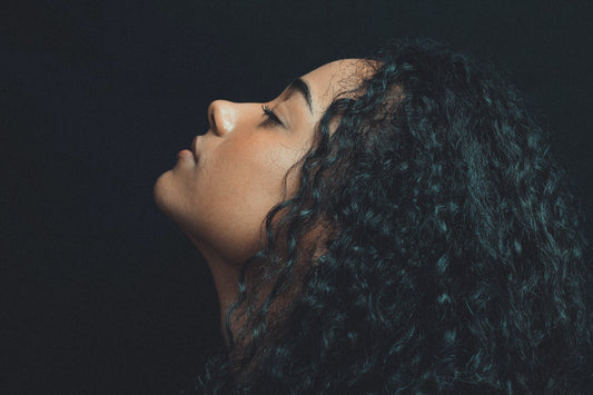 close-up-photo-of-woman-with-curly-hair